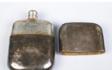A Victorian silver hip flask, with partial crest to the fron...