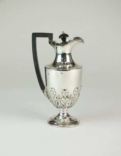 A Victorian silver hot water jug