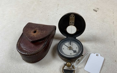A WWII period leather cased pocket compass.Condition Report There is...