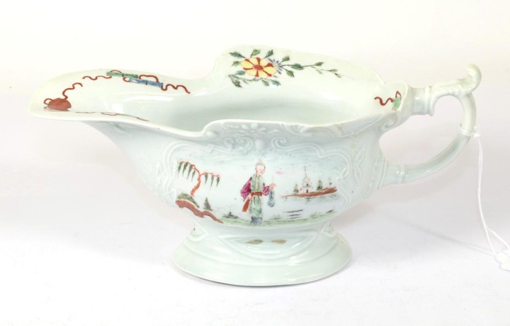 A Worcester Porcelain Silver Shaped Sauceboat, circa 1755, painted in...
