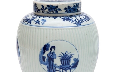 A blue and white covered jar