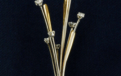 A brilliant-cut diamond stick pin.