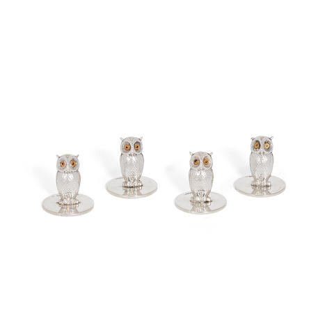 A cased set of four silver owl menu holders