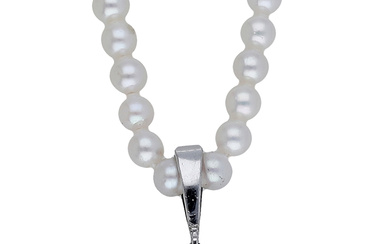 A cultured pearl and diamond pendant necklace, the single row of uniform...