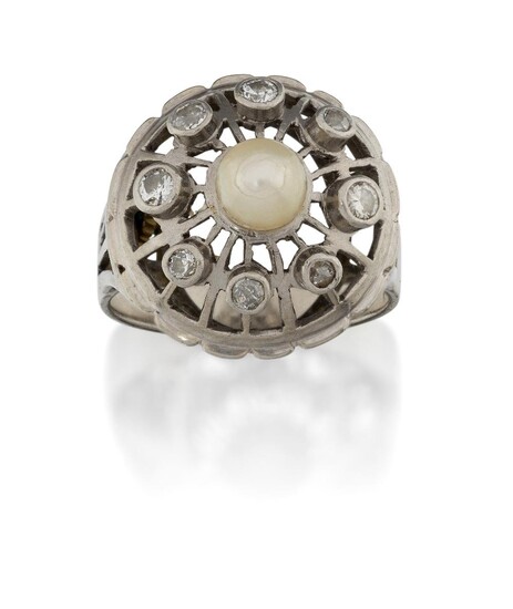 A diamond and cultured pearl ring, of domed design, the collet-set diamonds to an openwork mount framing a cultured pearl centre, hoop stamped 18ct, approx. ring size P