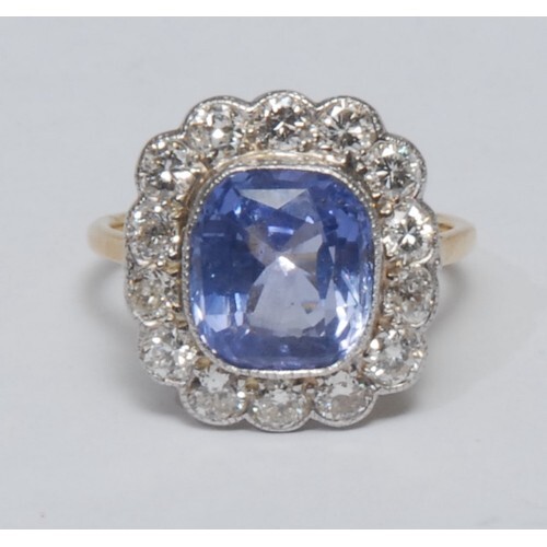A diamond and natural colour change sapphire cluster ring, l...