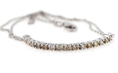 A diamond bracelet set with numerous brilliant-cut diamonds weighing app. 0.70 ct.,...