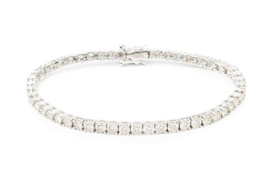 A diamond line bracelet, set in platinum with fifty round...