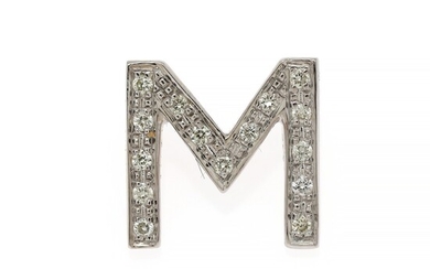 A diamond pendant in shape of the letter “M” set with numerous brilliant-cut diamonds, mounted in 18k white gold. W. 12.5 mm. H. 12.3 mm.