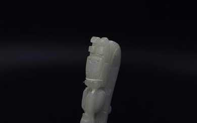 A fine Chinese carved antique white nephrite belt hook...