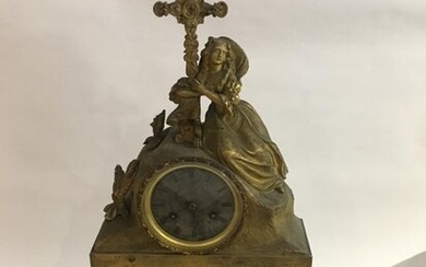 A gilt bronze clock, woman imploring at the...