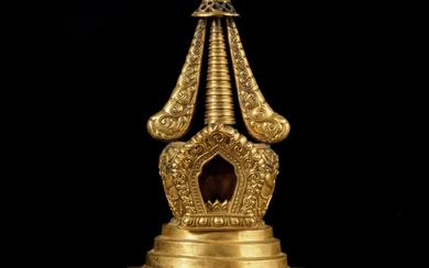 A gilt-copper alloy repoussé stupa, Tibeto-Chinese, 18th / 19th century
