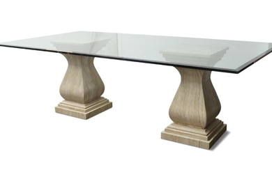 A glass top dining table, raised on variegated stone pedestals, of fluted baluster form, glass top is bevelled, 74cm high, 240cm wide, 120cm deep