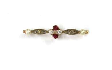A gold and silver, ruby, diamond split pearl bar brooch