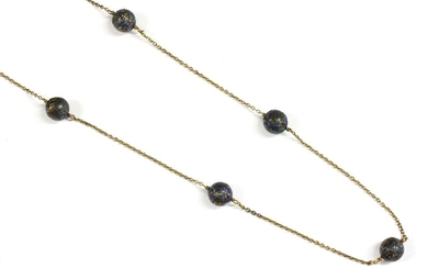 A gold enamel bead necklace