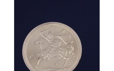 A gold sovereign coin