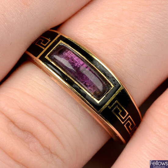 A late Georgian 9ct gold, Greek-key black enamel and foil back amethyst tapered mourning ring.