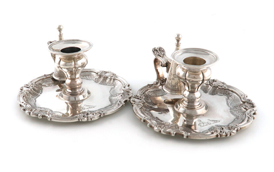 A matched pair of William IV and Victorian silver chamber sticks