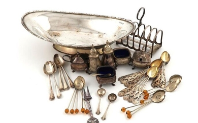 A mixed lot of silver items, comprising: an oval dish, foliate border, Chester 1919, a toast rack, a three-piece condiment set and seven spoons, plus Chinese items, a matching three-piece condiment set, a set of twelve teaspoons, the handles pierced...
