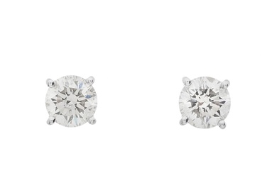 A pair of 18ct gold brilliant-cut diamond single-stone stud ...