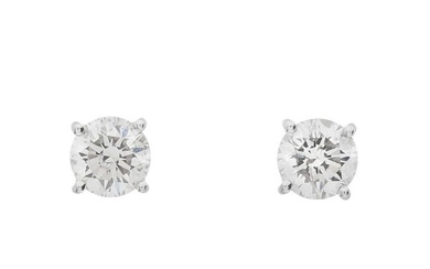 A pair of 18ct gold diamond stud earrings