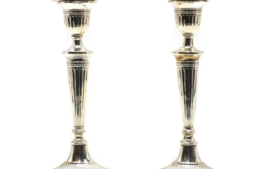 A pair of Adam revival silver candlesticks