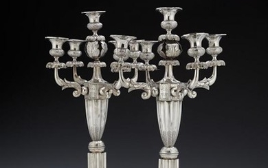 A pair of Spanish silver five light candelabra by José Ramírez de Arellano