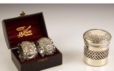 A pair of Victorian silver napkin rings, ‘SG’ Birmingham 189...