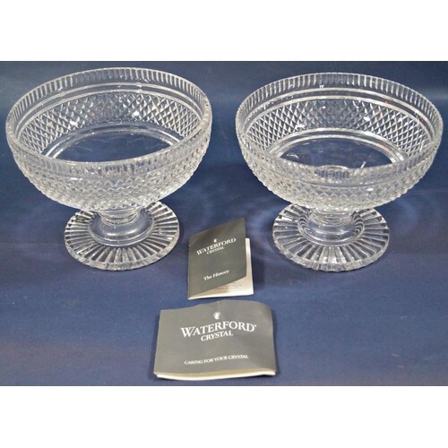 A pair of Waterford crystal stem bowls with hob nail cut det...