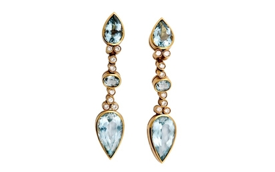 A pair of blue topaz and diamond pendent earrings