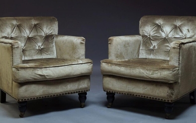 A pair of button back armchairs, of recent manufacture, upholstered...