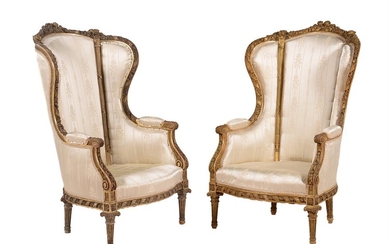 A pair of carved giltwood and upholstered armchairs in Louis XVI style