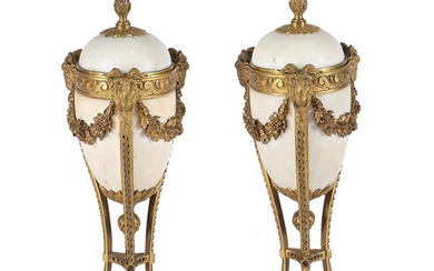A pair of gilt-bronze and white marble mounted cassolettes in Louis XVI style