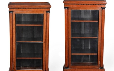 A pair of mahogany and partridge wood pier cabinets in 19th century style