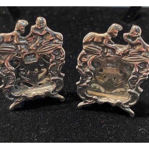 A pair of miniature Sterling Silver Cherub Photo Frames on s...