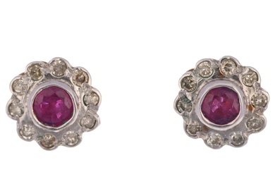 A pair of ruby and diamond flowerhead cluster earrings, with...