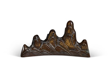 A parcel-gilt bronze mountain-shaped brushrest Late Ming dynasty, 17th century | 明十七世紀 局部鎏金銅筆山