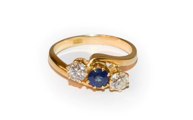 A sapphire and diamond three stone twist ring, a round...