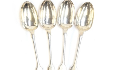 A set of four Victorian silver fiddle pattern table spoons b...