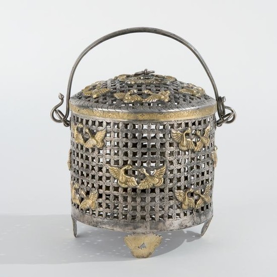 A silver and silver gilt basket and cover