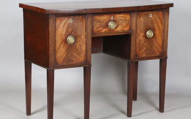 A small George III mahogany sideboard, the bowfront top above three oak-lined drawers with bone inla