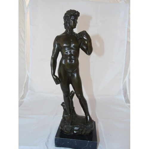 A well cast bronze figure of David on a marble base