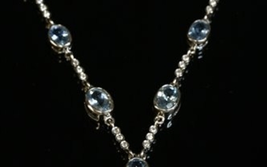 A white gold aquamarine and diamond necklace