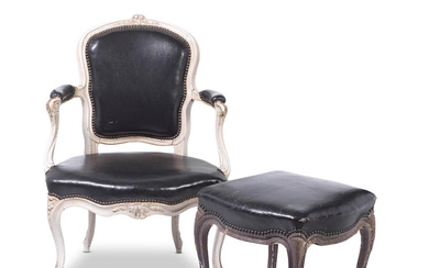 A white painted beech and black leather fauteuil In the...