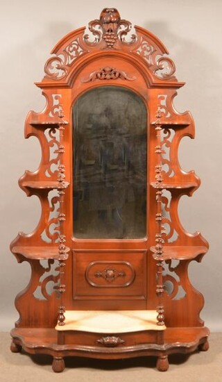 American Victorian Walnut Carved and Molded Etagere.