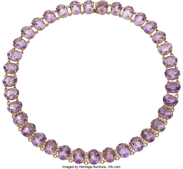 Amethyst, Diamond, Gold Necklace The necklace features oval-shaped...