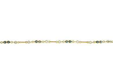 An 18ct gold sapphire and colourless gem bracelet.
