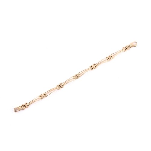 An 18ct yellow gold triple bar bracelet, the clasp stamped ....