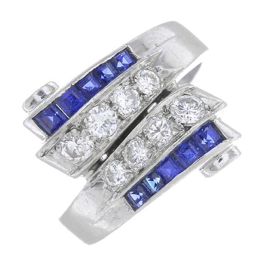 An Art Deco platinum, diamond and sapphire ring. With