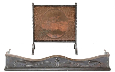 An Arts and Crafts bronze and copper fender